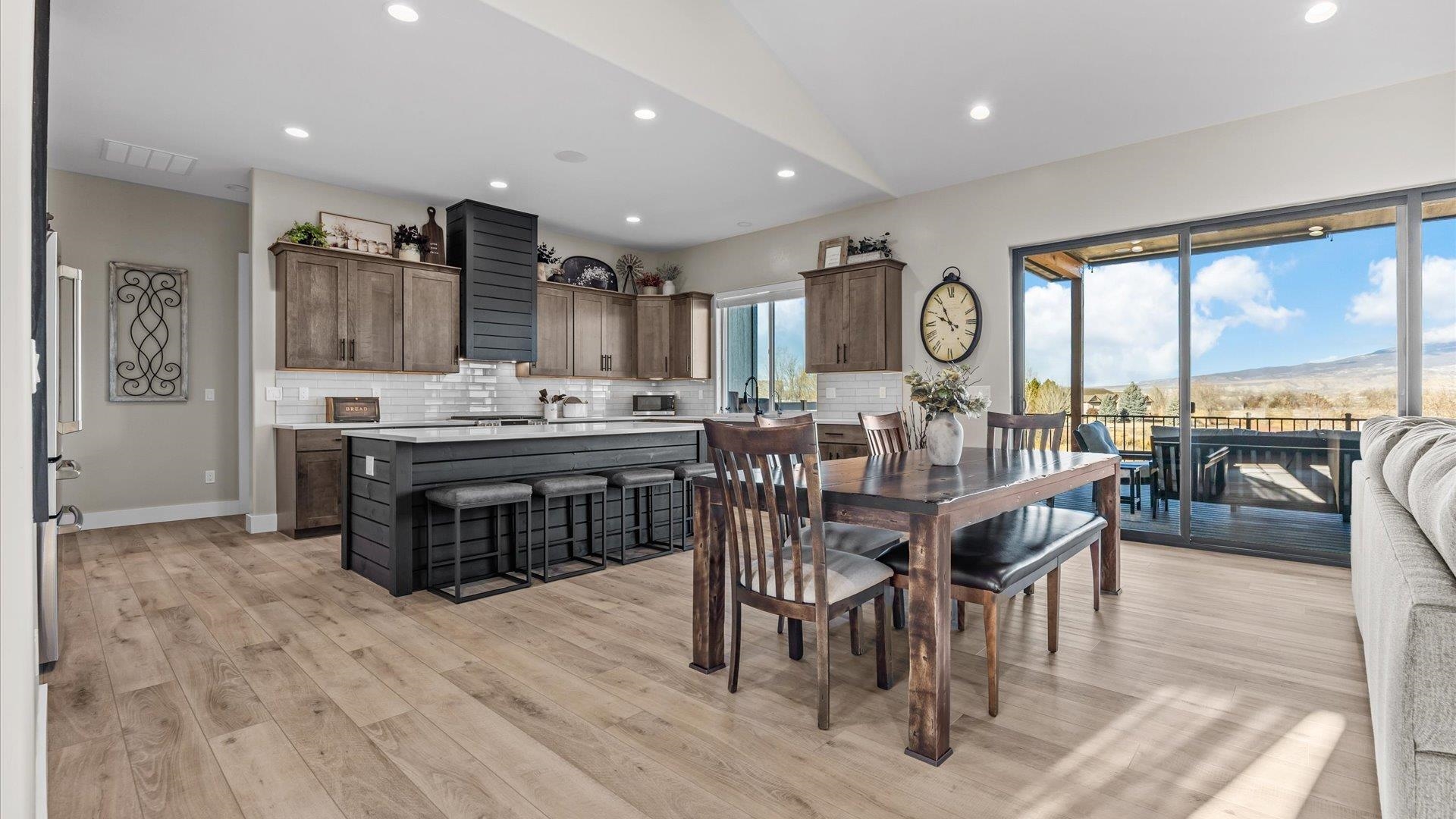 1774 Trapper Court Delta, CO 81416 - Photo 6 of 42 a view of a dining room with furniture window and outside view