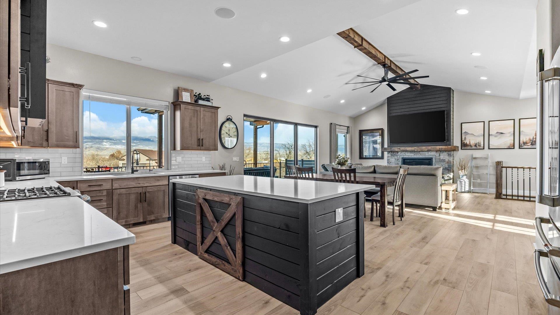 1774 Trapper Court Delta, CO 81416 - Photo 10 of 42 a kitchen with lots of counter top space a sink appliances and cabinets