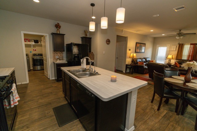 23123 Barrington Bluff Trail Spring, TX 77373 - Photo 15 of 50 a large kitchen with a table and chairs