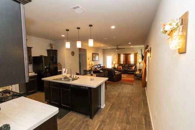 23123 Barrington Bluff Trail Spring, TX 77373 - Photo 20 of 50 a large kitchen with a counter space a sink and appliances