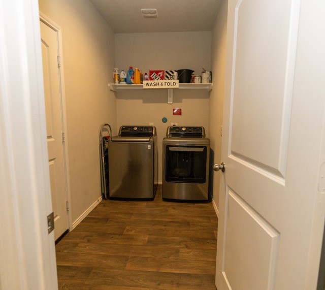 23123 Barrington Bluff Trail Spring, TX 77373 - Photo 45 of 50 a kitchen with stainless steel appliances granite countertop a refrigerator and a sink