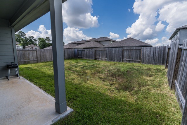 23123 Barrington Bluff Trail Spring, TX 77373 - Photo 48 of 50 a view of a backyard with wooden fence