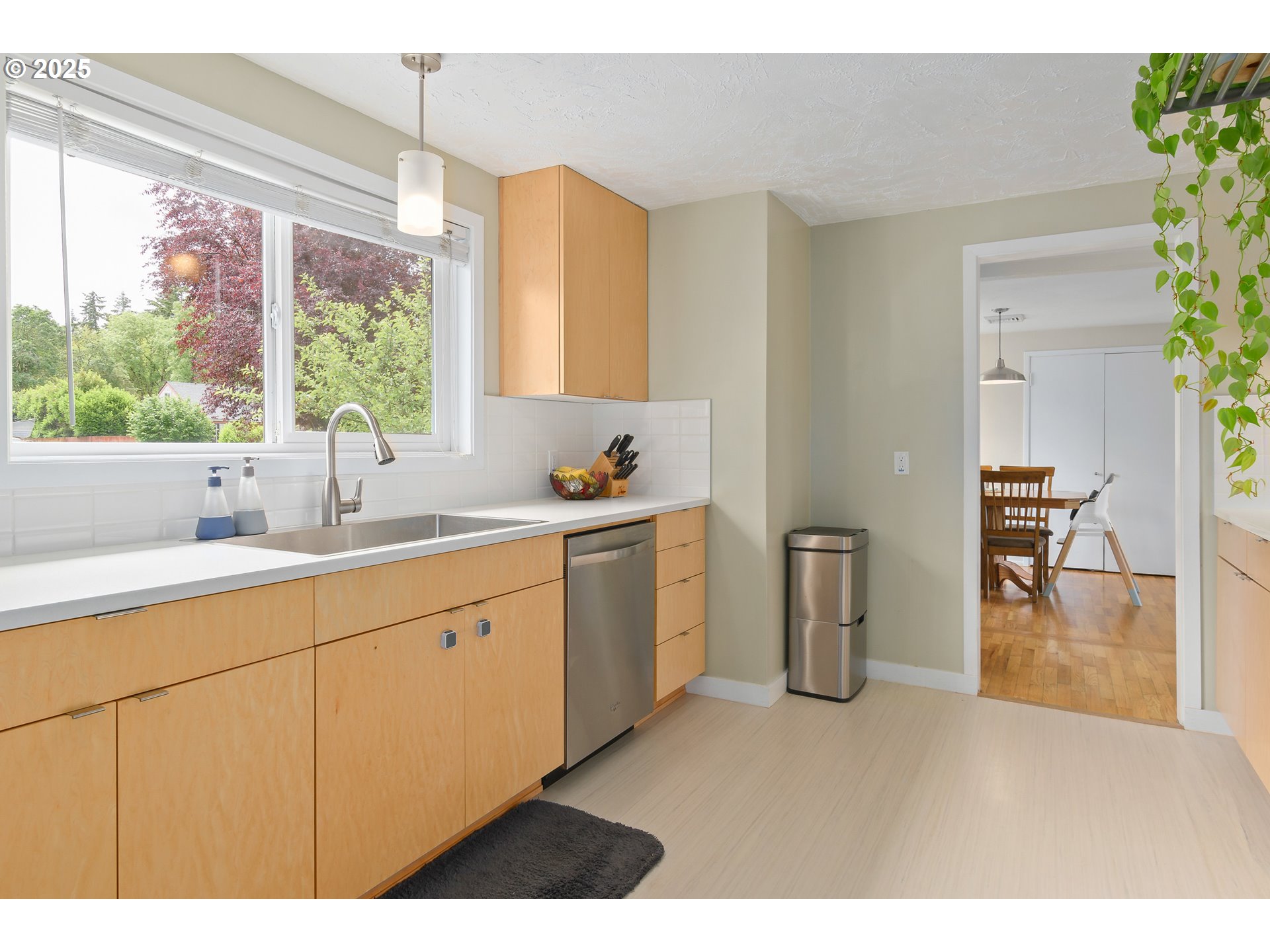 3417 Harlow Road Eugene, OR 97401 - Photo 11 of 40 a kitchen with a sink and large window