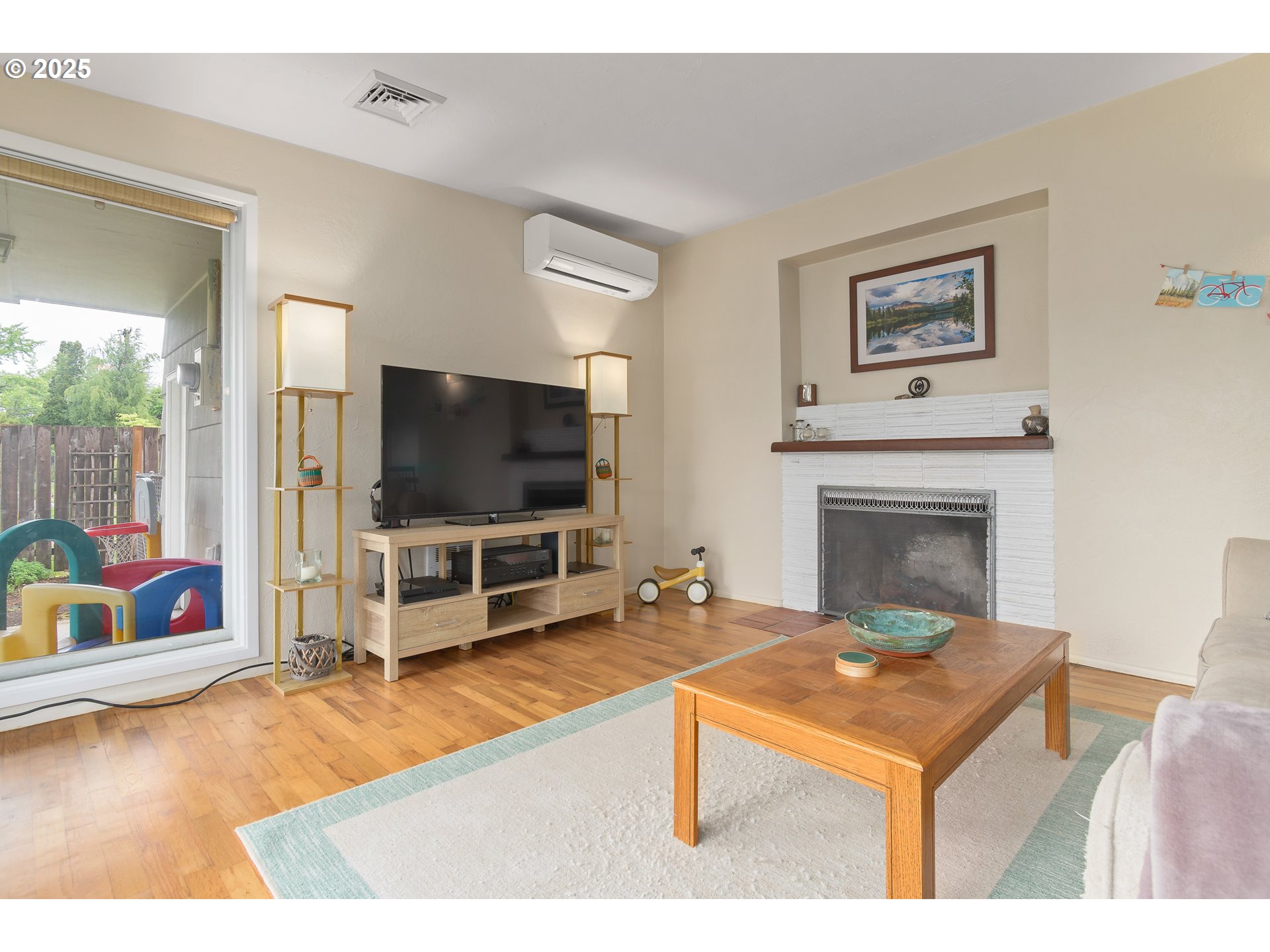 3417 Harlow Road Eugene, OR 97401 - Photo 17 of 40 a living room with furniture and a flat screen tv