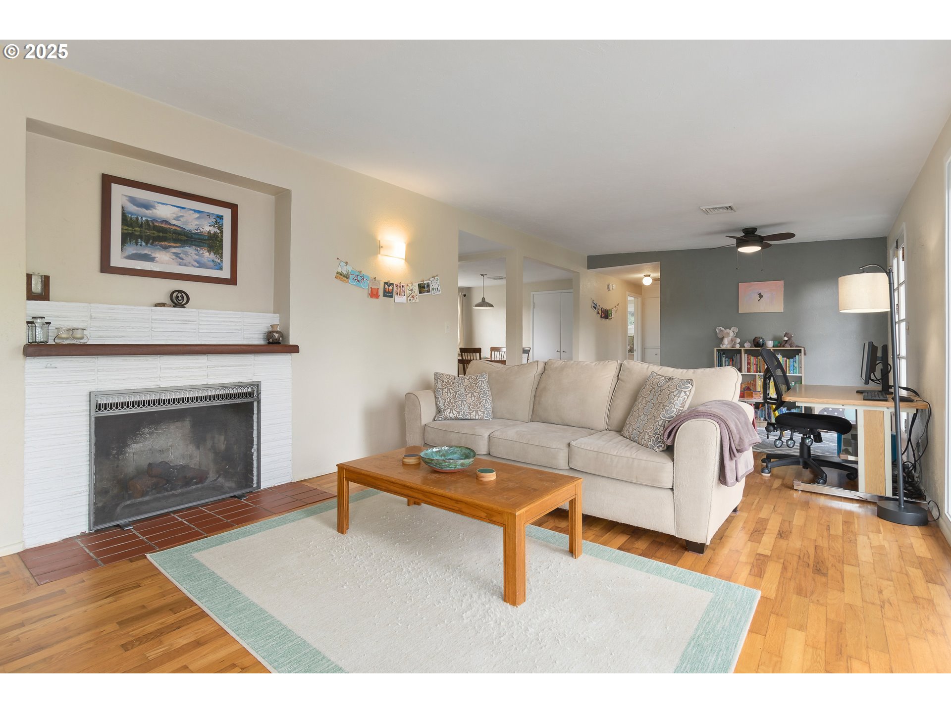 3417 Harlow Road Eugene, OR 97401 - Photo 18 of 40 a living room with furniture and a fireplace