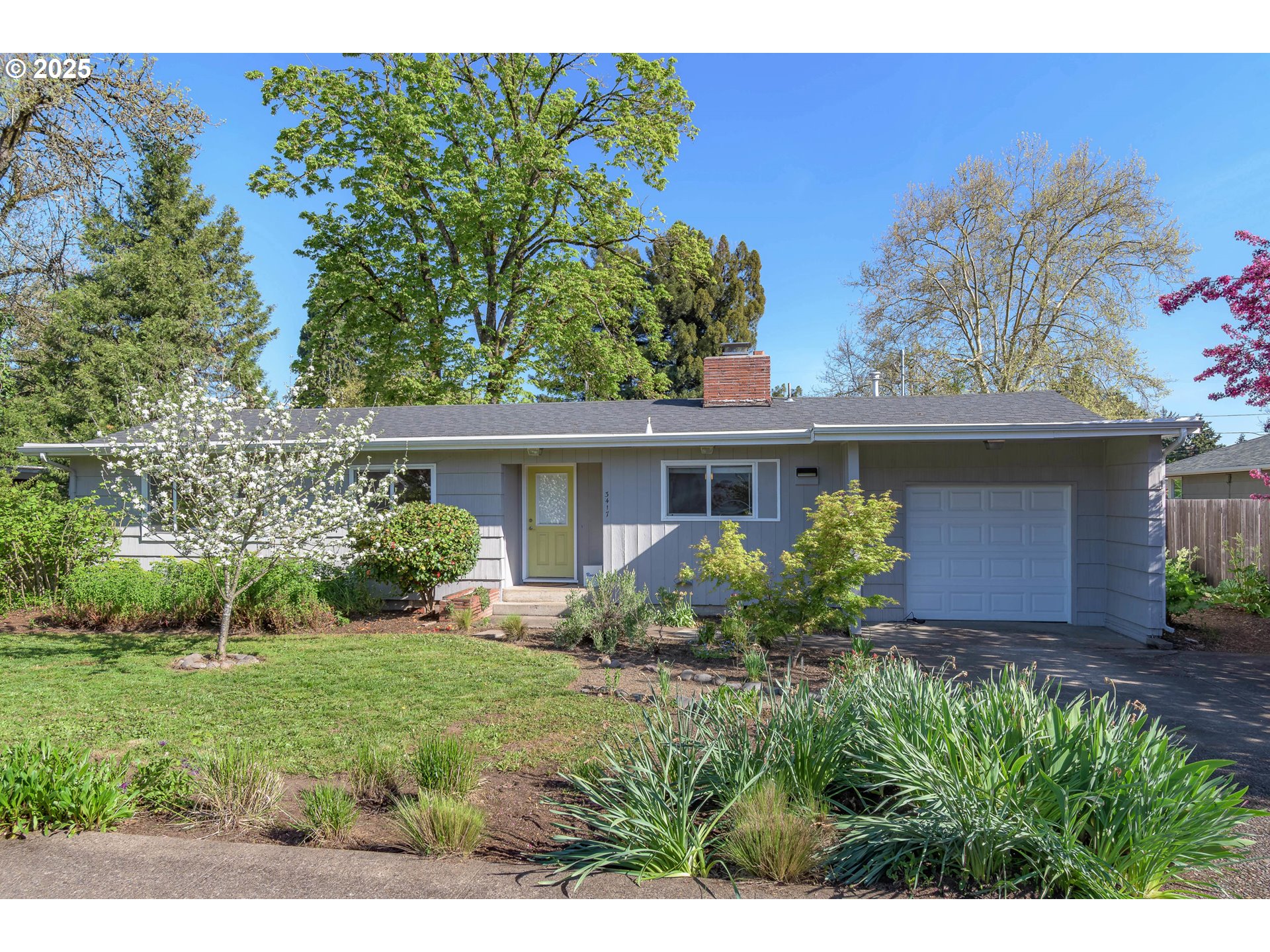 3417 Harlow Road Eugene, OR 97401 - Photo 2 of 40 a front view of house with yard and green space