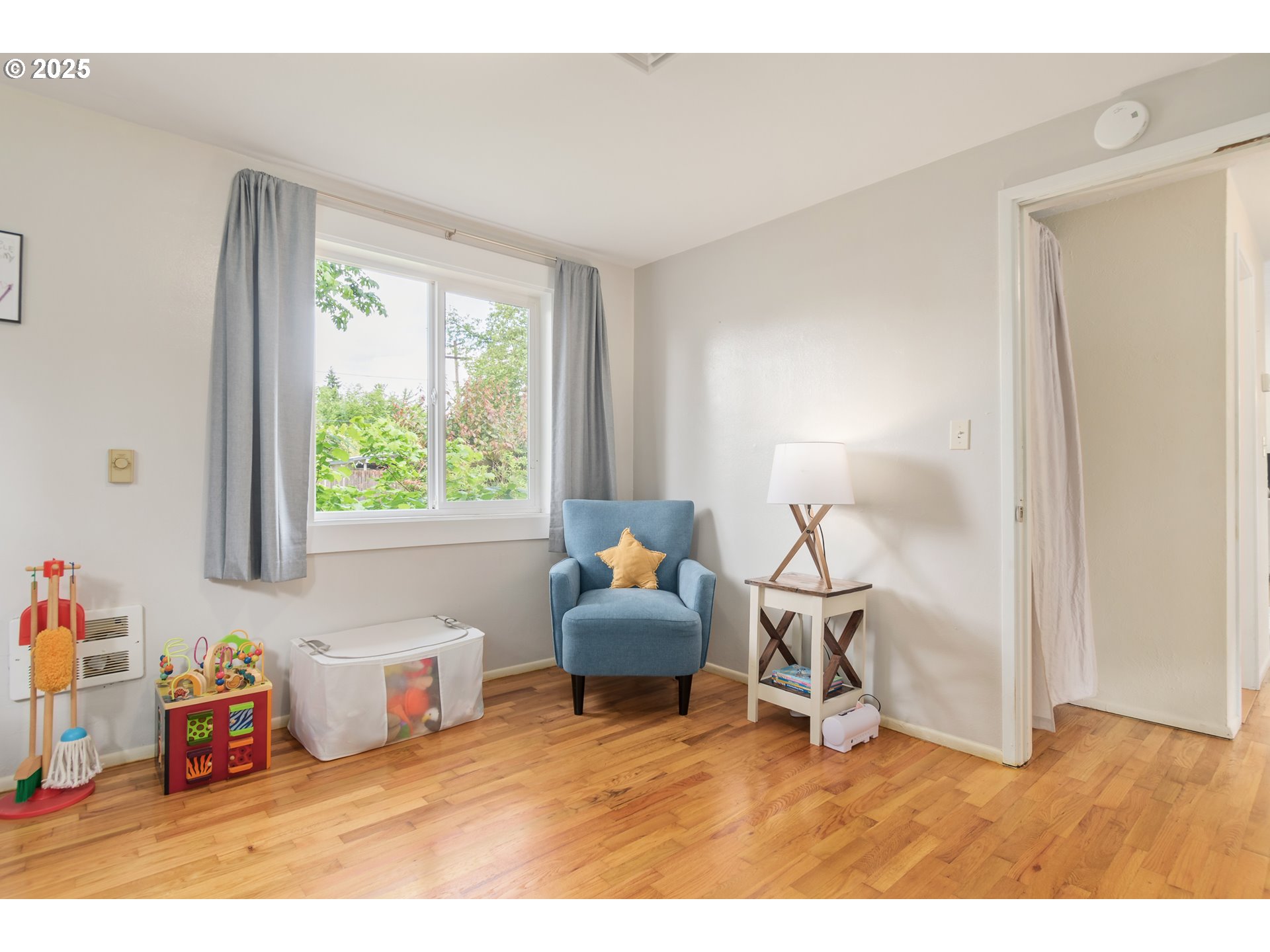 3417 Harlow Road Eugene, OR 97401 - Photo 26 of 40 a living room with furniture and a window