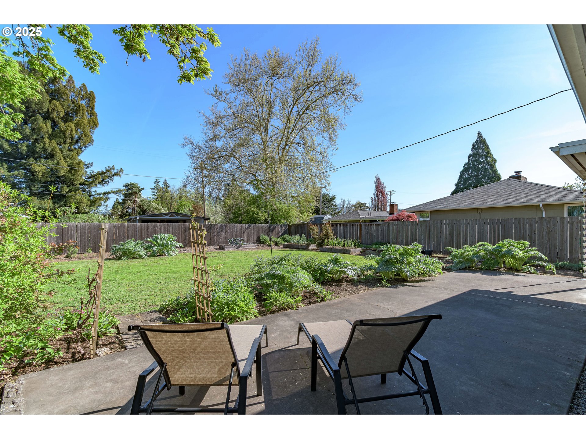 3417 Harlow Road Eugene, OR 97401 - Photo 30 of 40 a view of a yard with furniture and a garden