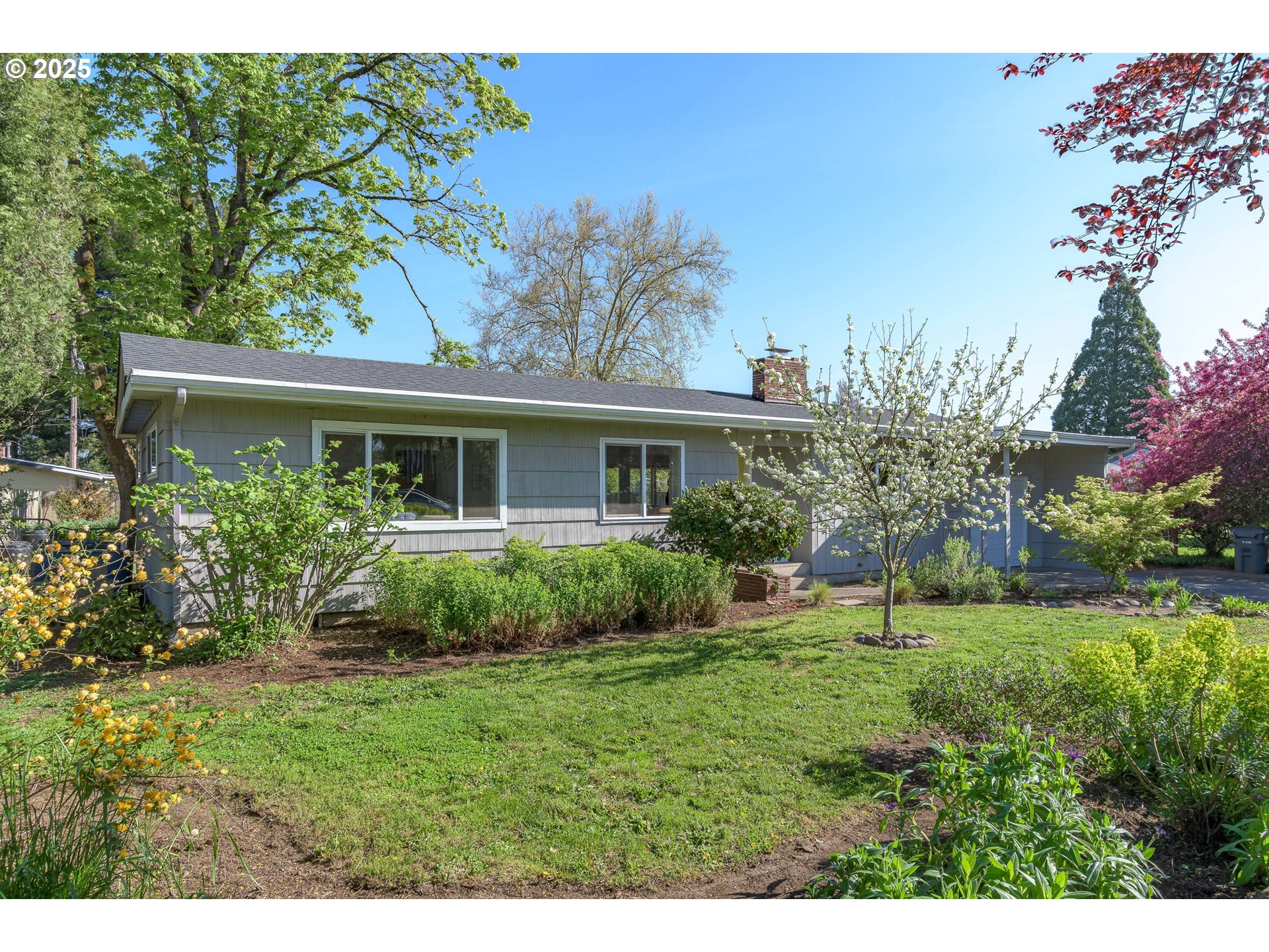 3417 Harlow Road Eugene, OR 97401 - Photo 39 of 40 a view of a house with backyard and garden