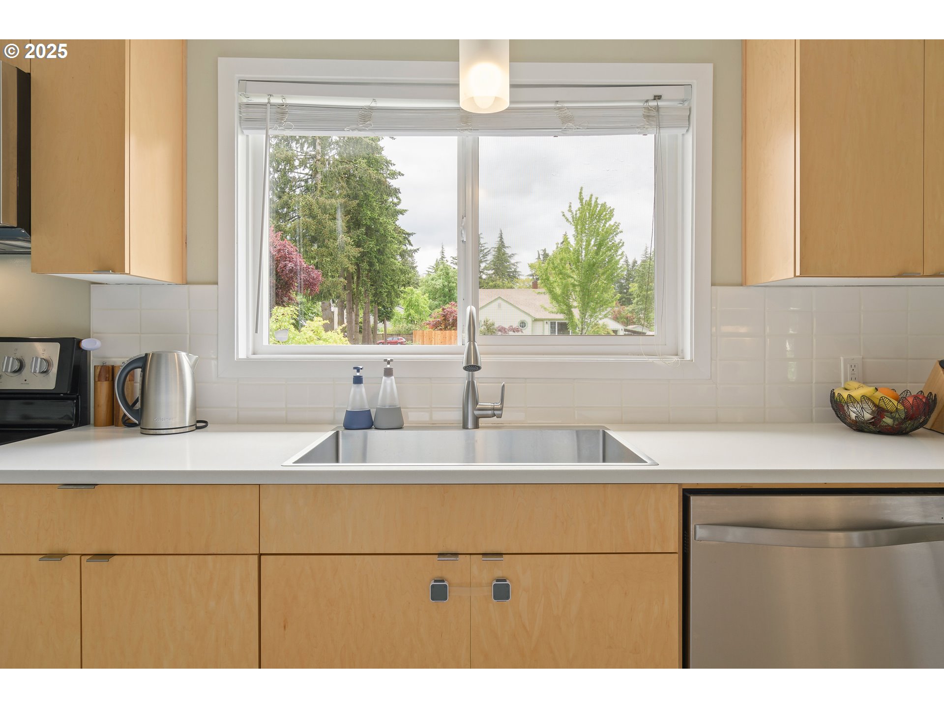 3417 Harlow Road Eugene, OR 97401 - Photo 7 of 40 a kitchen with a sink and large window