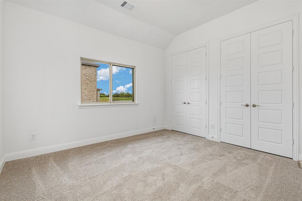 6044 Mango Drive Sanger, TX 76266 - Photo 19 of 27 a view of an empty room with a window