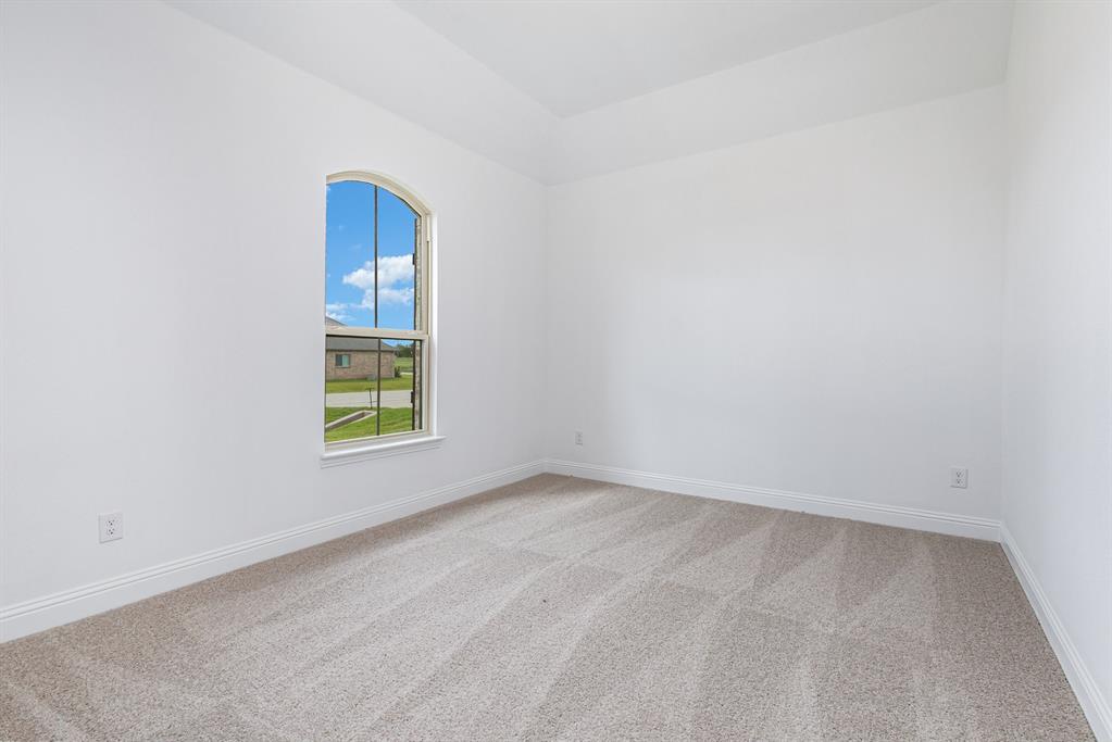 6044 Mango Drive Sanger, TX 76266 - Photo 20 of 27 an empty room with windows