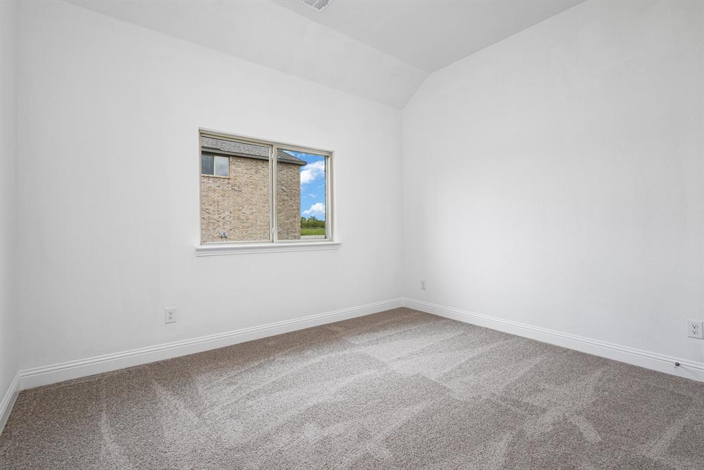 6044 Mango Drive Sanger, TX 76266 - Photo 9 of 27 an empty room with a window