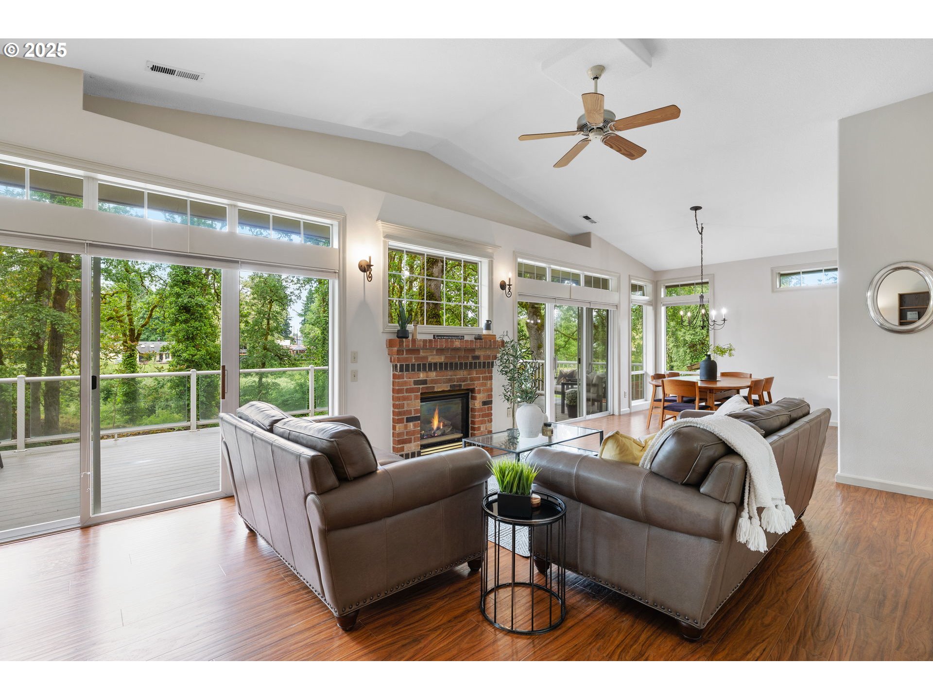 690 North Shepherd Road Washougal, WA 98671 - Photo 18 of 38 a living room with furniture a ceiling fan and a large window