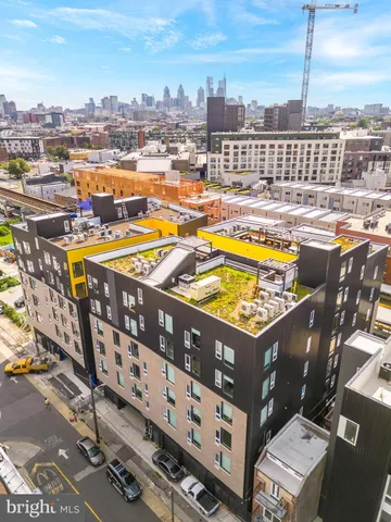 a view of a balcony with wooden floor