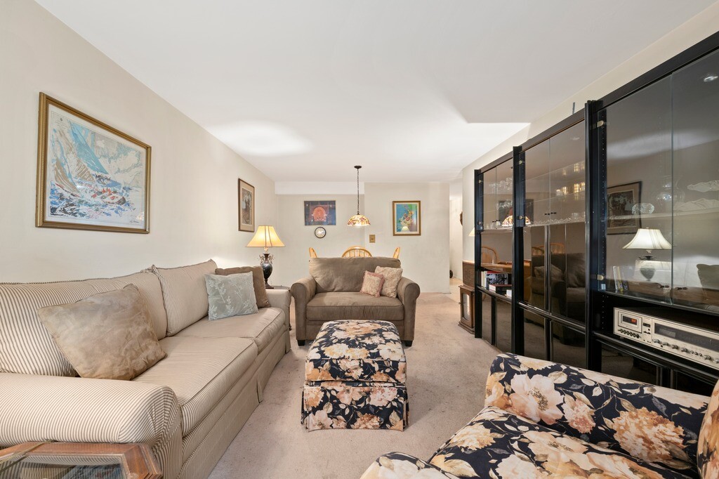 100 West 94th Street, Unit 5C Manhattan, NY 10025 - Photo 2 of 7 a living room with furniture and wooden floor