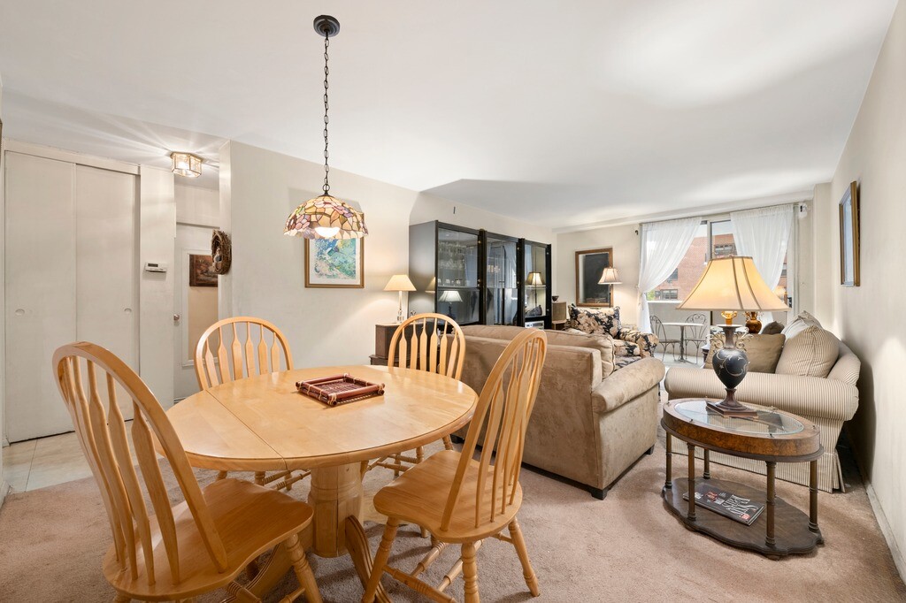 100 West 94th Street, Unit 5C Manhattan, NY 10025 - Photo 3 of 7 a dining room with furniture and window