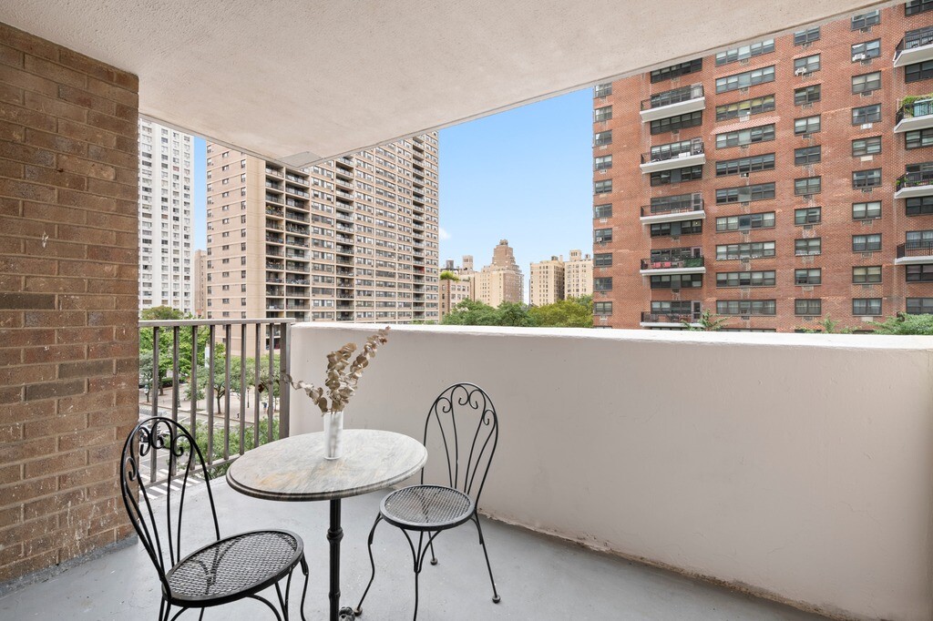 100 West 94th Street, Unit 5C Manhattan, NY 10025 - Photo 6 of 7 a dining room with furniture and wooden floor