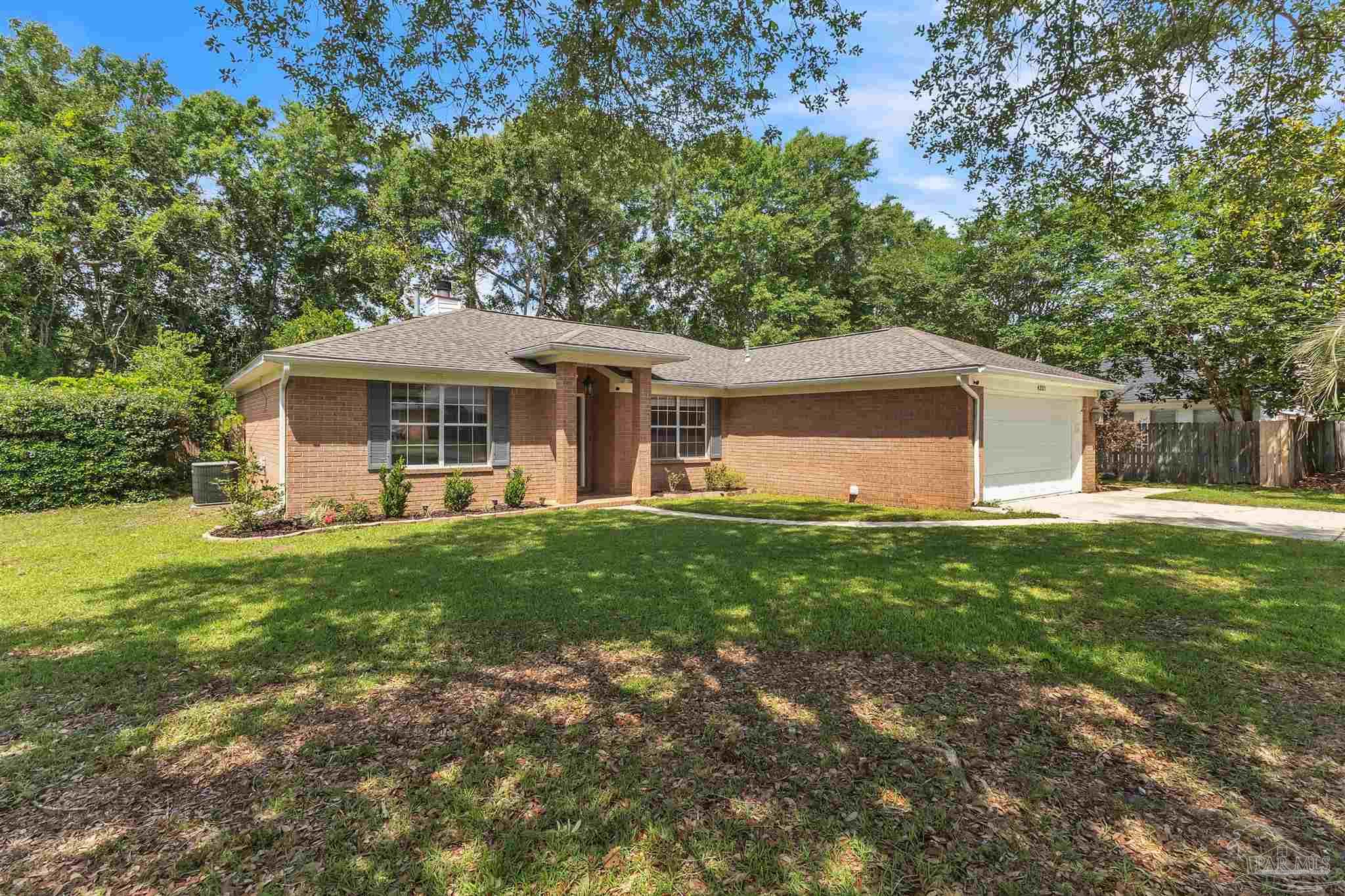 4321 Ridgeland Drive Pace, FL 32571 - Photo 24 of 36 a view of a house with a backyard