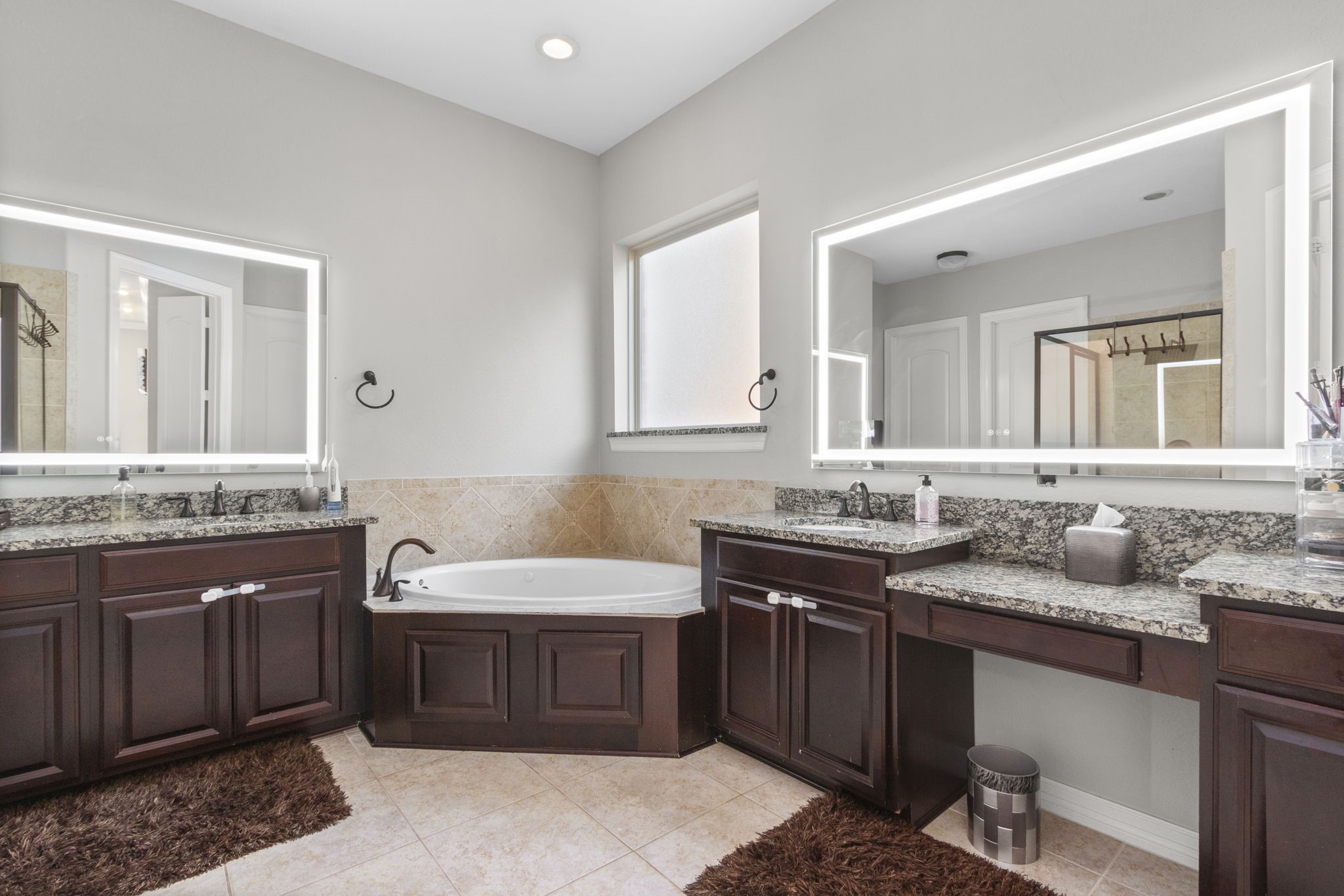 23211 Belted Kingfisher Trail Spring, TX 77389 - Photo 22 of 47 Separate vanity spaces in this huge primary bathroom