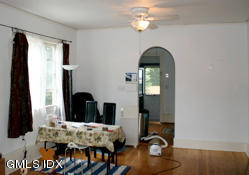 4 Wescott Court Riverside, CT 06878 - Photo 4 of 7 a view of a livingroom with furniture and window