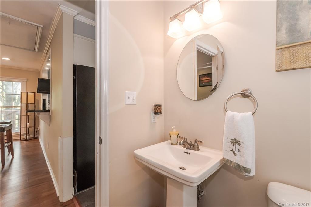 29050 Snapper Point Tega Cay, SC 29708 - Photo 14 of 24 a bathroom with a sink and mirror