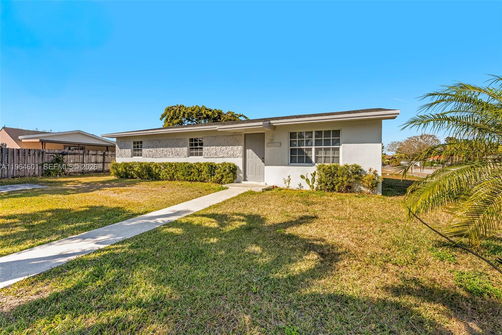 15231 Southwest 302nd Street Homestead, FL 33033 - Photo 1 of 30 a view of the house with a swimming pool