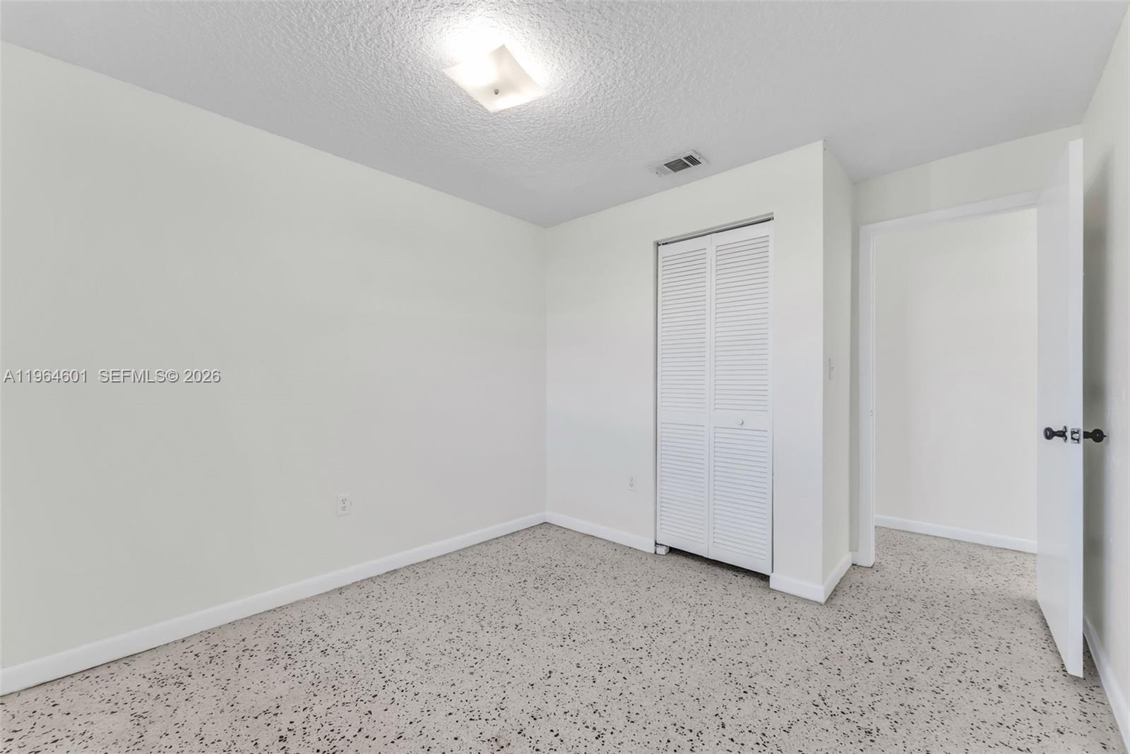 15231 Southwest 302nd Street Homestead, FL 33033 - Photo 16 of 30 a view of an empty room