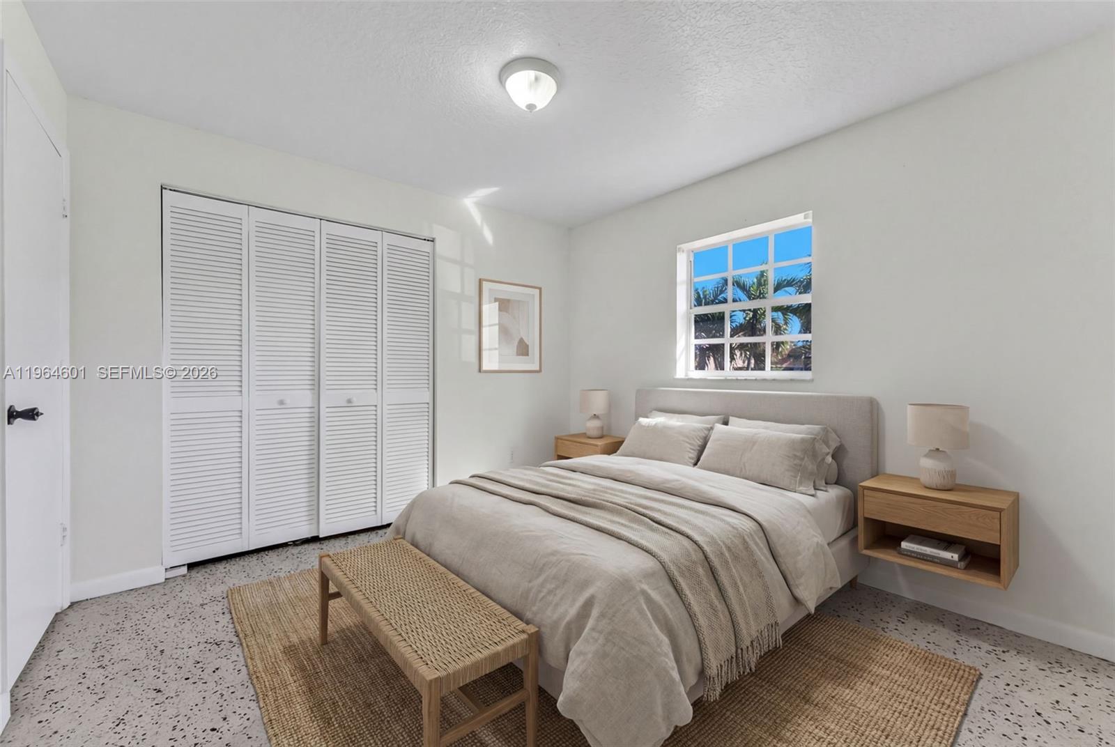 15231 Southwest 302nd Street Homestead, FL 33033 - Photo 18 of 30 a bedroom with a bed and a window