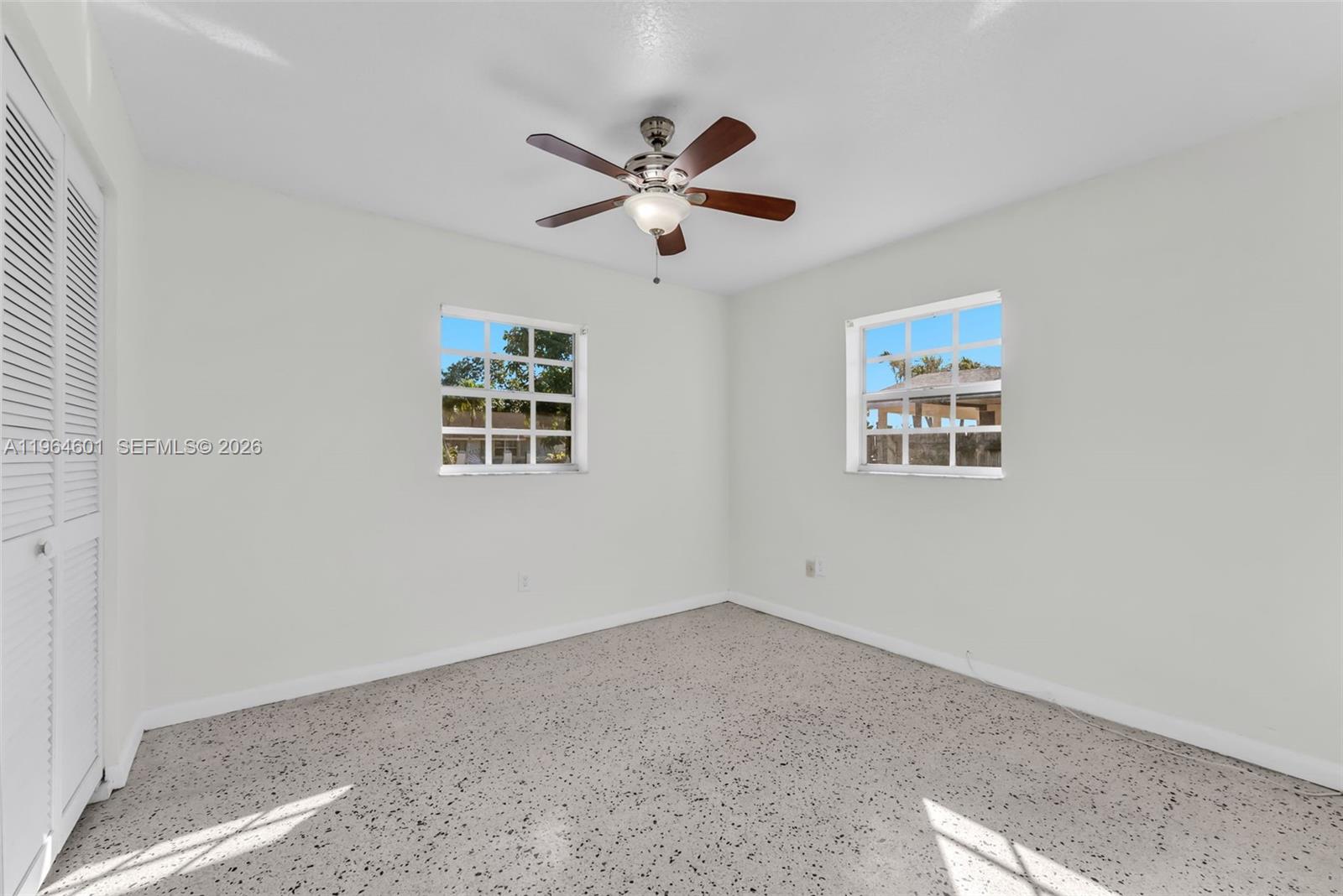 15231 Southwest 302nd Street Homestead, FL 33033 - Photo 21 of 30 a view of empty room with wooden floor