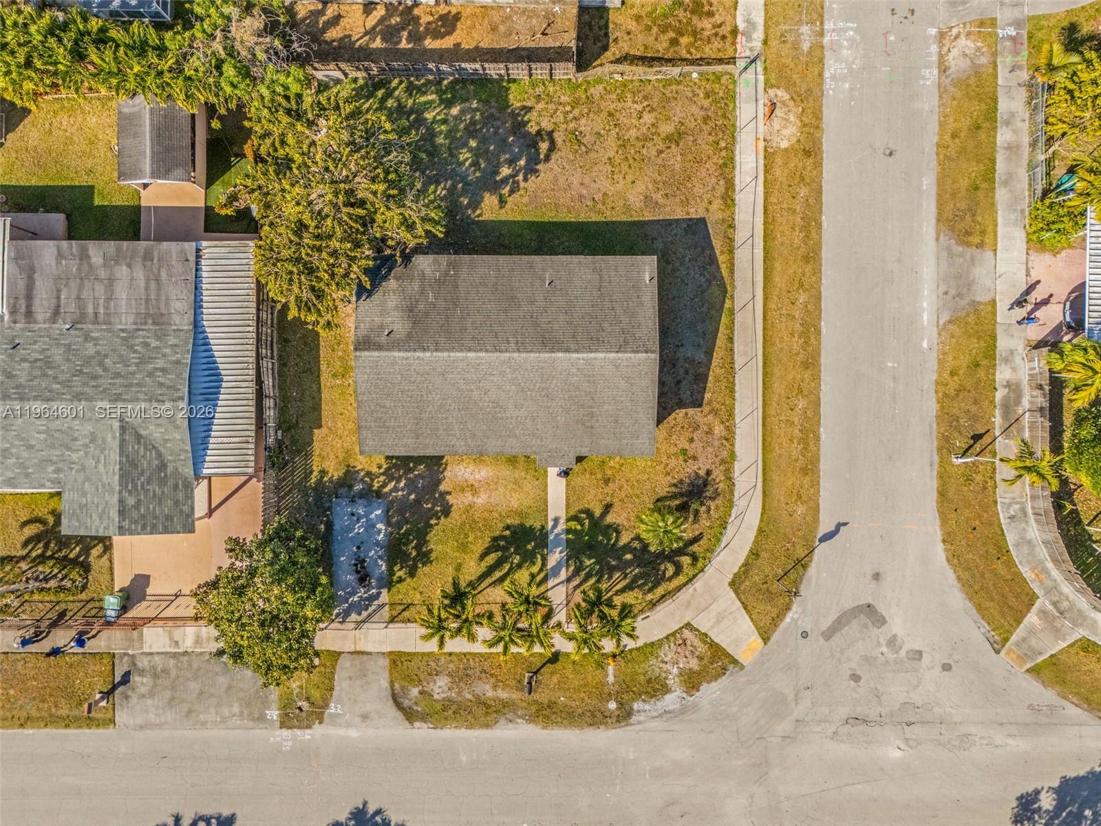 15231 Southwest 302nd Street Homestead, FL 33033 - Photo 28 of 30 front view of a house with a fountain