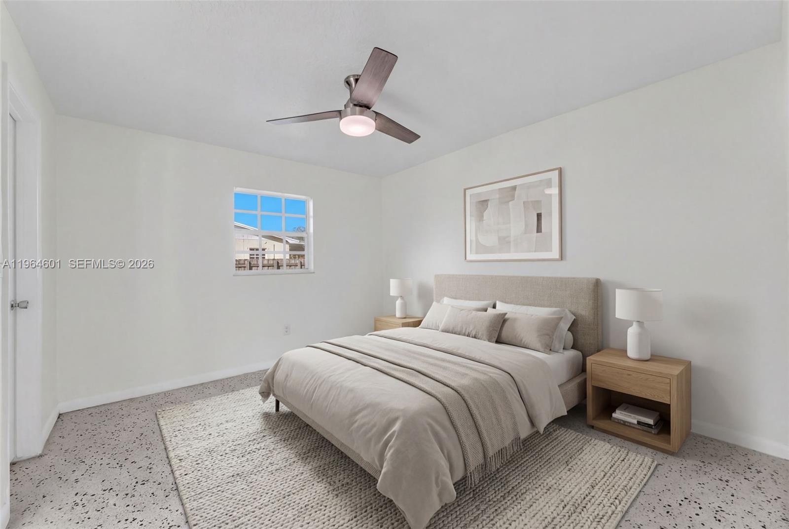 15231 Southwest 302nd Street Homestead, FL 33033 - Photo 10 of 30 a bedroom with a bed and a painting on the wall