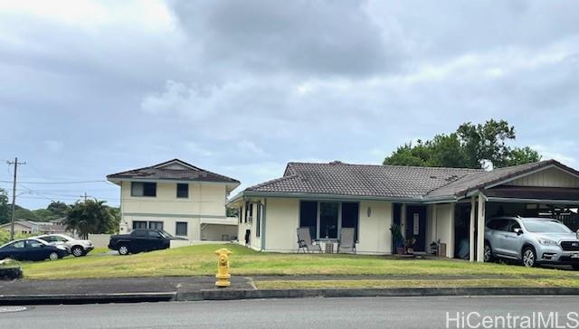 47-166 Wailehua Road Kaneohe, HI 96744 - Photo 12 of 17 a view of a car park in front of house