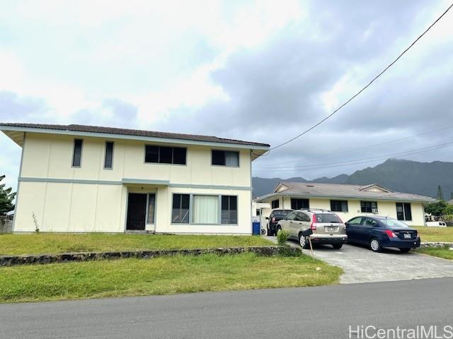 47-166 Wailehua Road Kaneohe, HI 96744 - Photo 9 of 17 a couple of cars parked in front of house