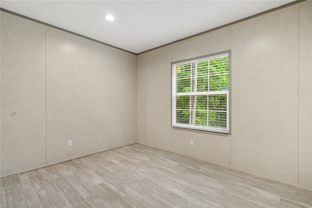 419 Austin Drive Anderson, SC 29624 - Photo 28 of 36 Bright room with window offering lush outdoor views and durable flooring for comfortable living.