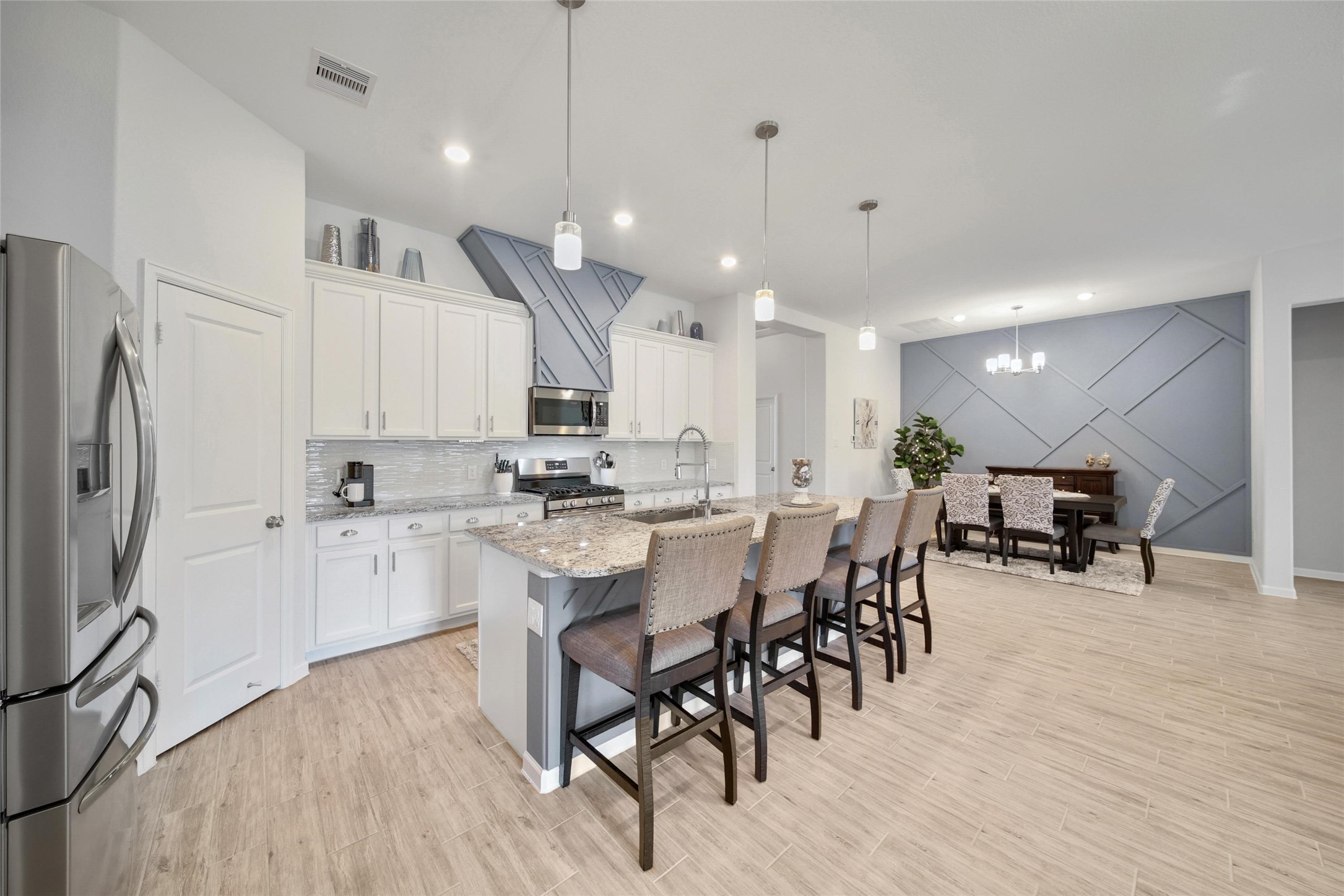 3422 Warwick River Trail Houston, TX 77365 - Photo 14 of 46 a large kitchen with a table and chairs