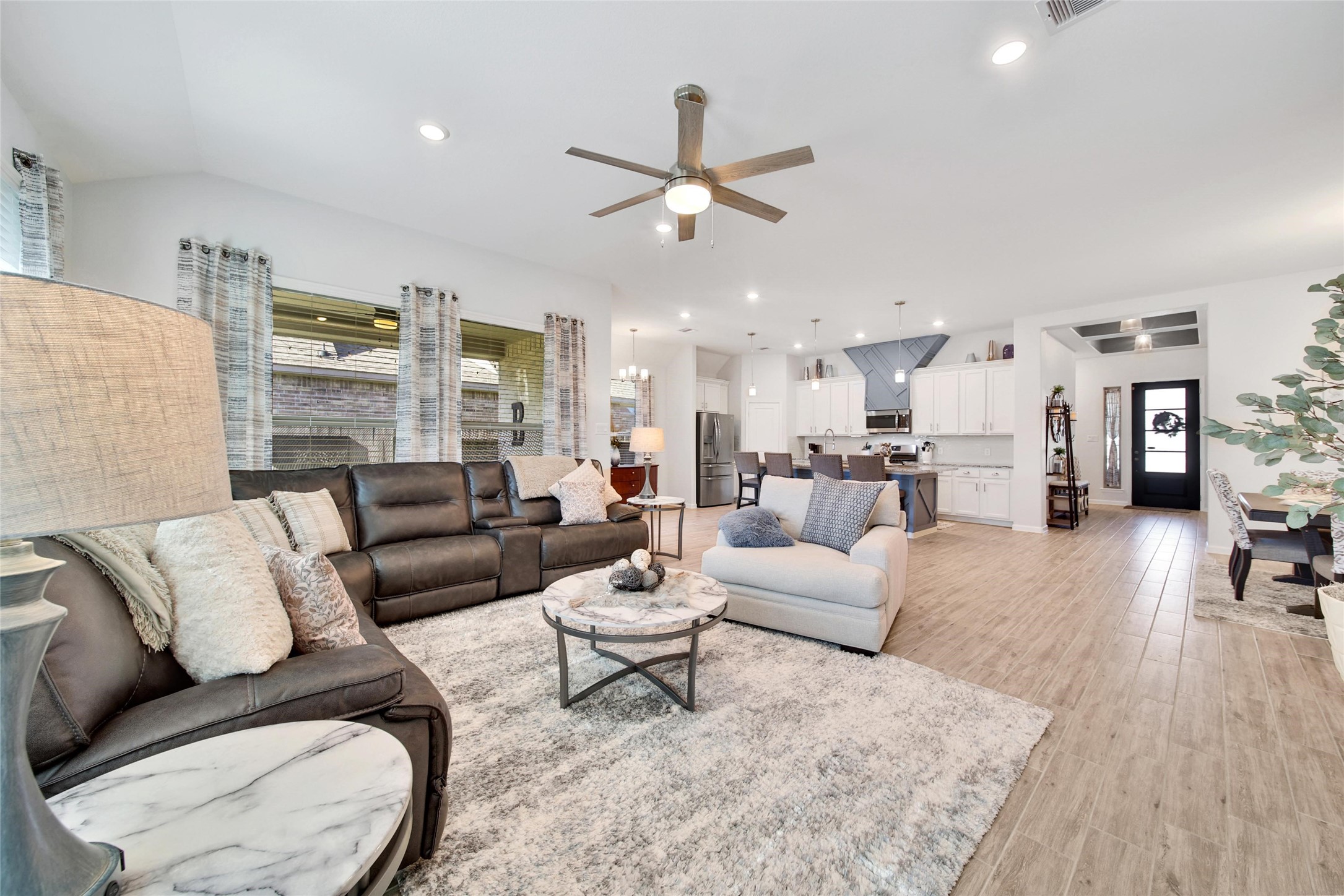 3422 Warwick River Trail Houston, TX 77365 - Photo 21 of 46 a living room with furniture and wooden floor