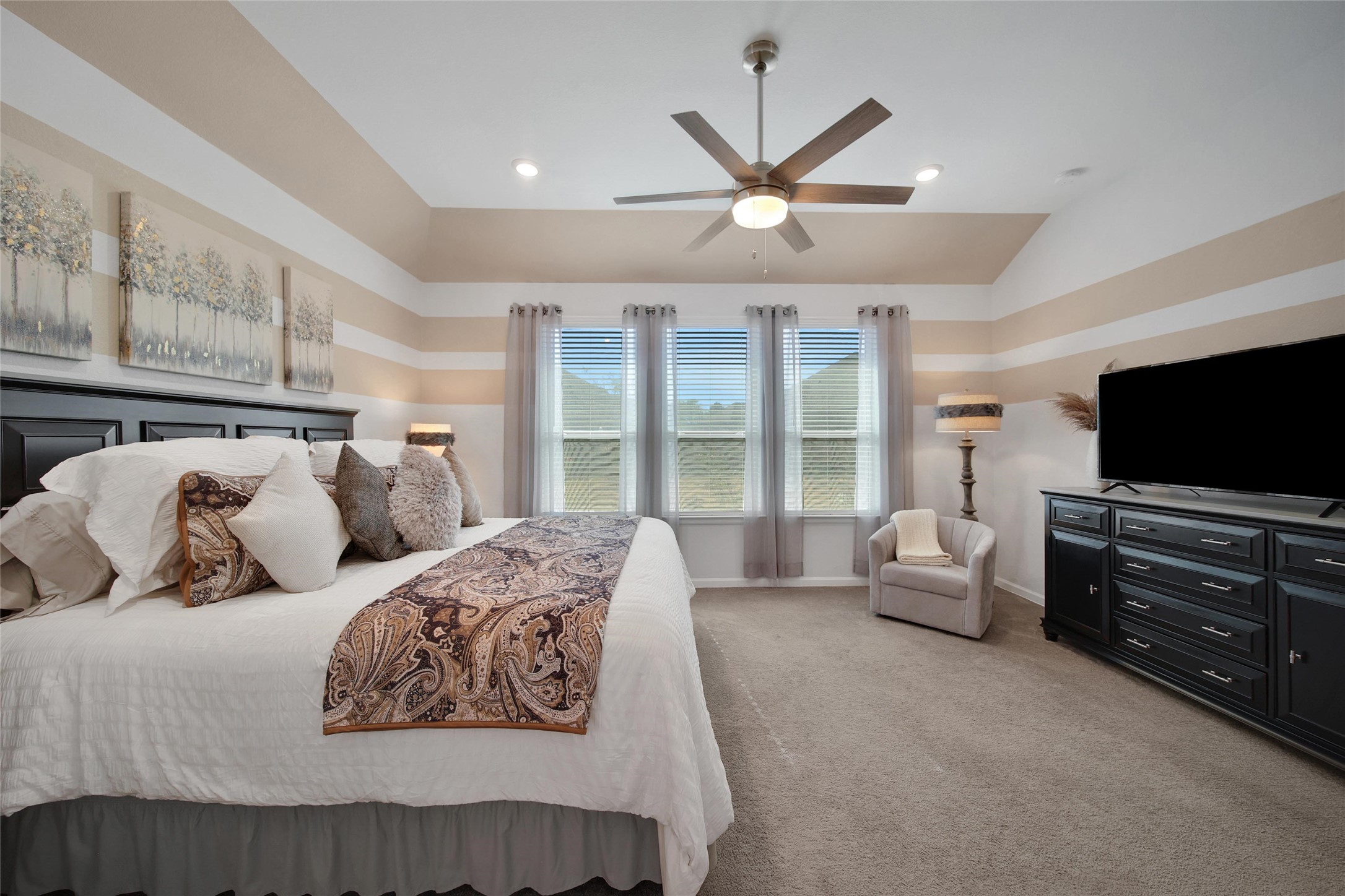 3422 Warwick River Trail Houston, TX 77365 - Photo 25 of 46 a bed room with two bed and a flat screen tv
