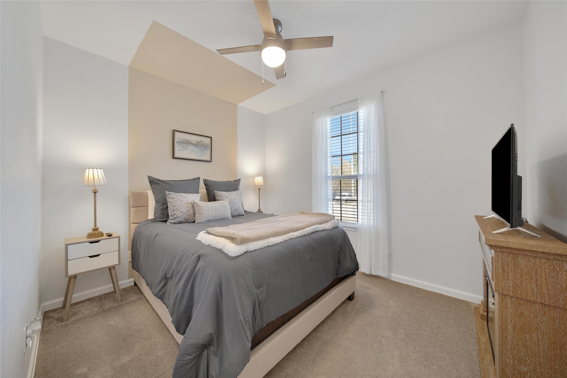 3422 Warwick River Trail Houston, TX 77365 - Photo 29 of 46 a bedroom with a bed and a flat screen tv