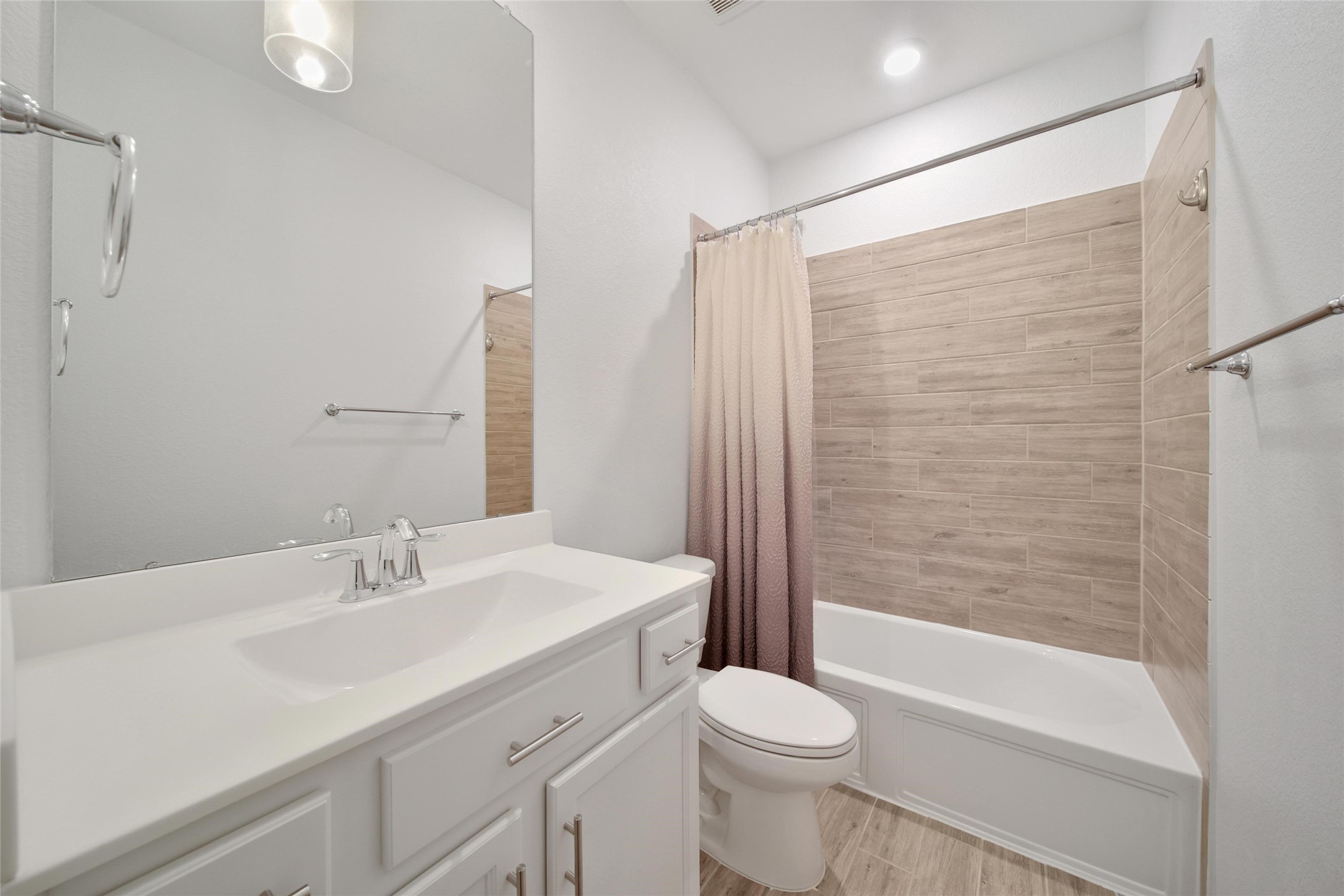 3422 Warwick River Trail Houston, TX 77365 - Photo 30 of 46 a bathroom with a sink a toilet and shower