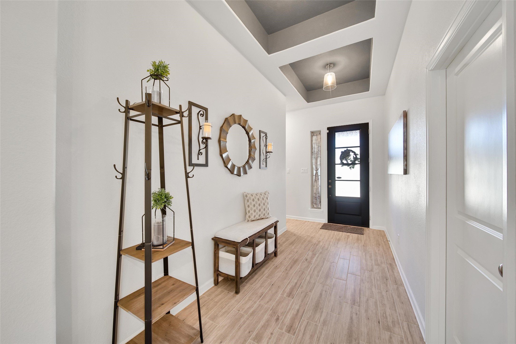 3422 Warwick River Trail Houston, TX 77365 - Photo 4 of 46 a view of a hallway with wooden floor and furniture
