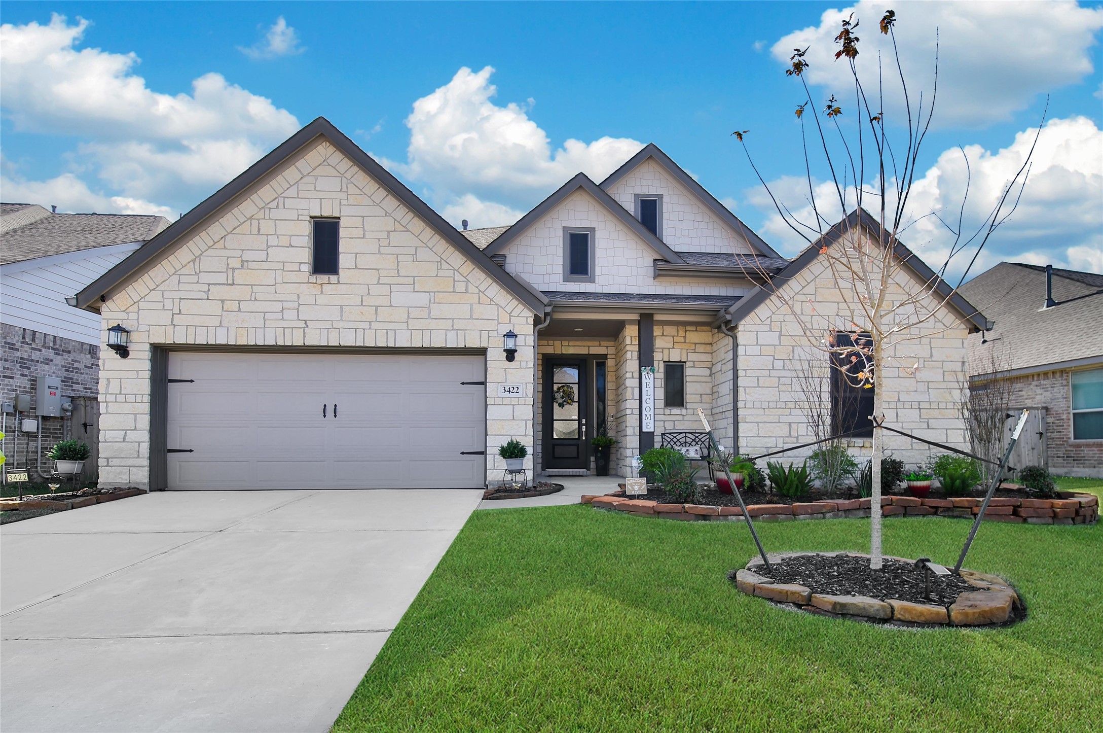 3422 Warwick River Trail Houston, TX 77365 - Photo 45 of 46 a front view of a house with a yard and garage