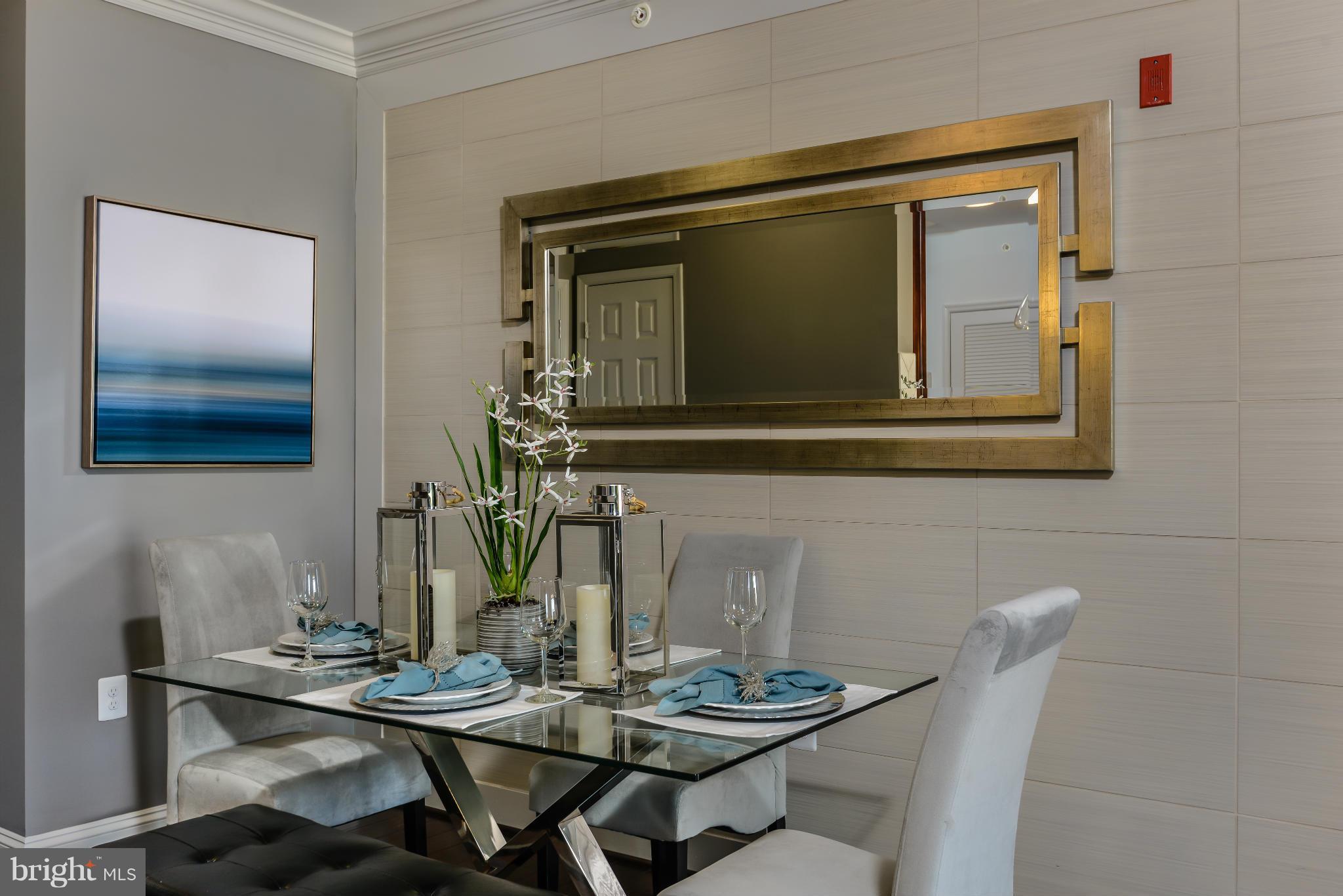 3750 Clara Downey Avenue, Unit 35 Silver Spring, MD 20906 - Photo 4 of 14 a dining room with furniture and wooden floor
