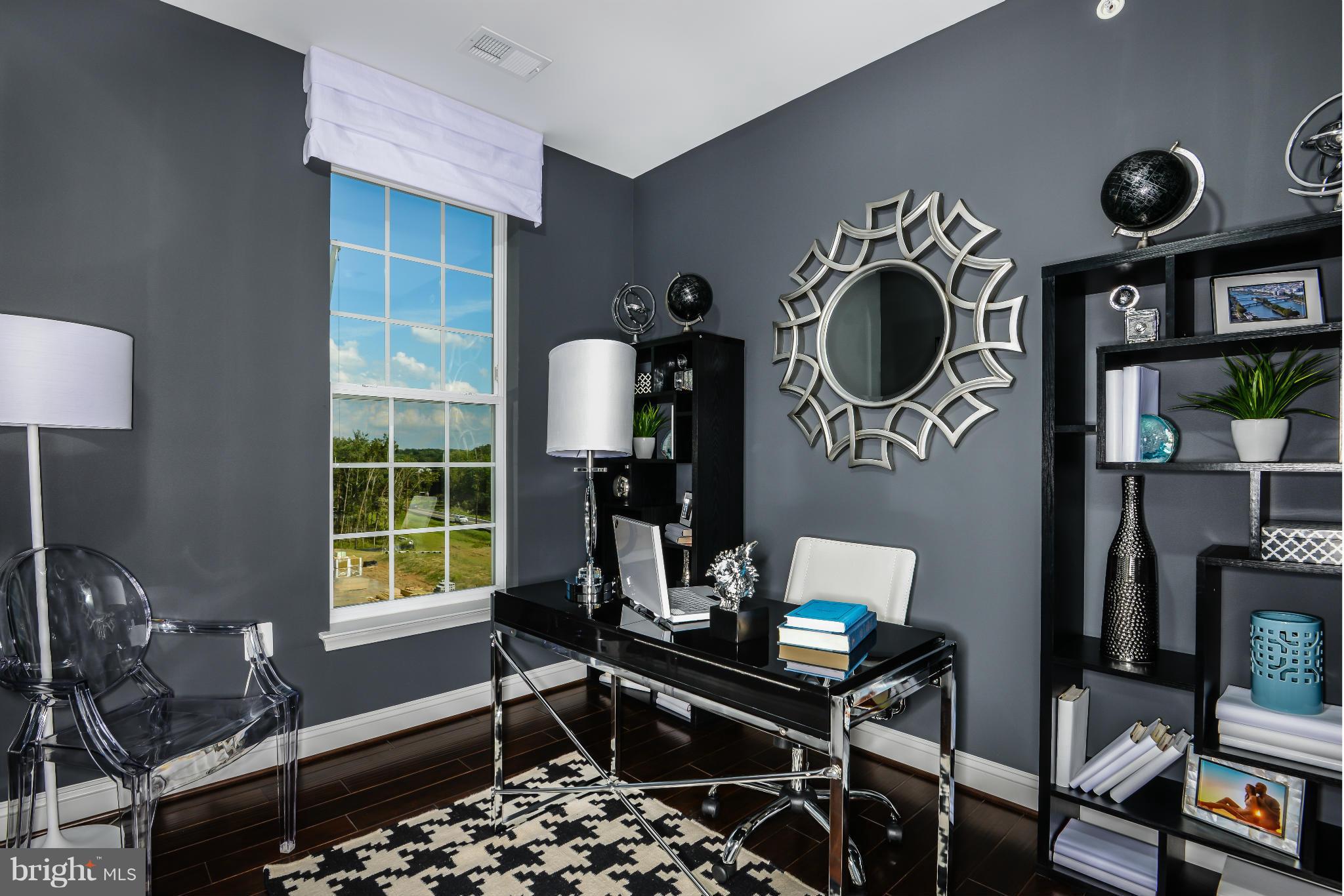 3750 Clara Downey Avenue, Unit 35 Silver Spring, MD 20906 - Photo 10 of 14 a room with furniture and a window