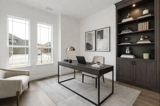 a view of a workspace with a window and cabinet