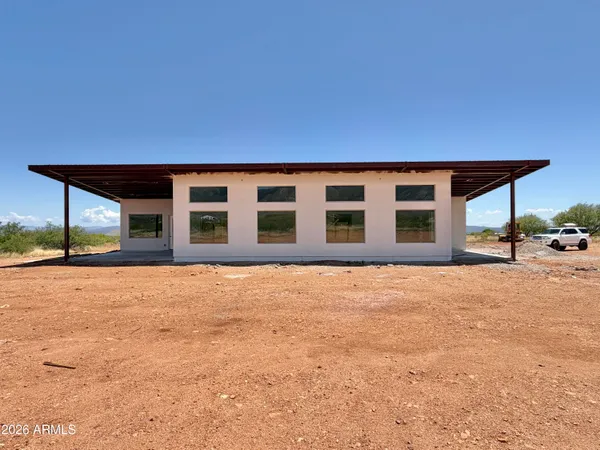 a house view with a outdoor space
