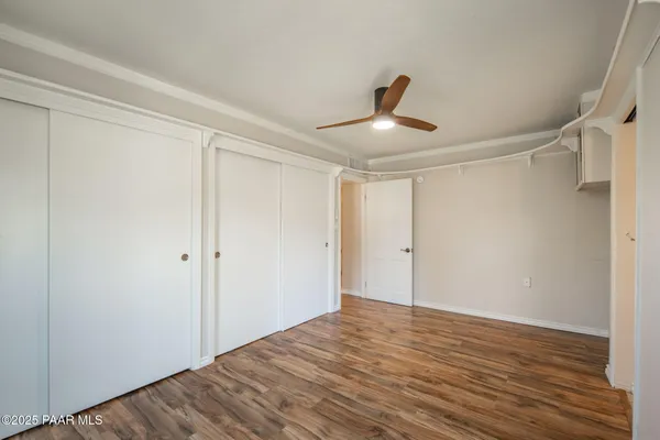 a bathroom with a bathtub sink and mirror