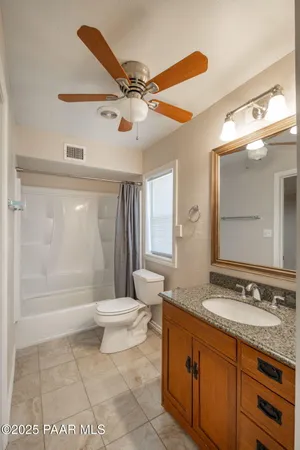 a view of a yard with a house and a tree