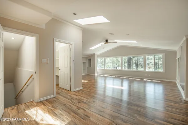 a view of a yard with a tree