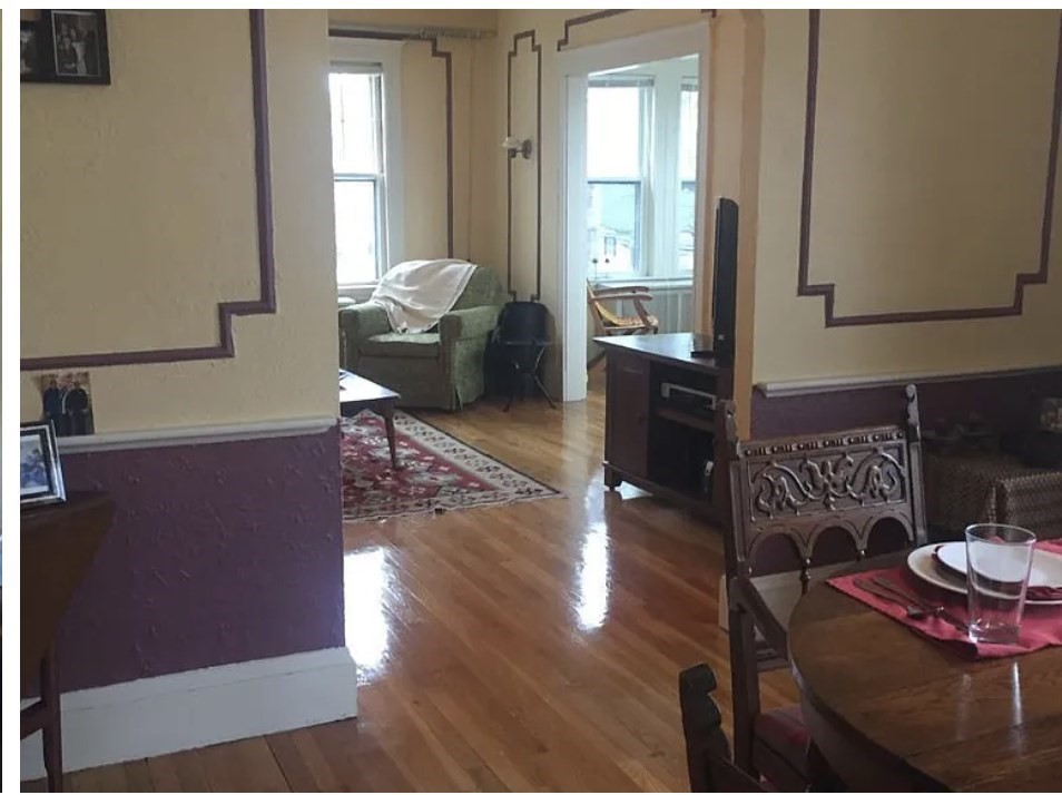 30 Lawrence Street, Unit 2 Everett, MA 02149 - Photo 12 of 13 a living room with furniture and a fireplace